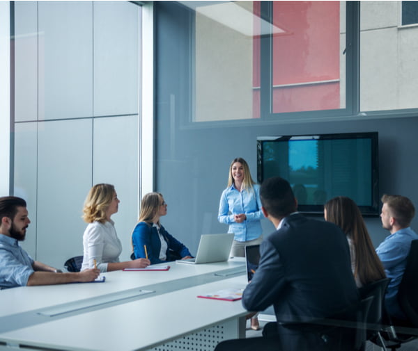 Colleagues working together in a conference room