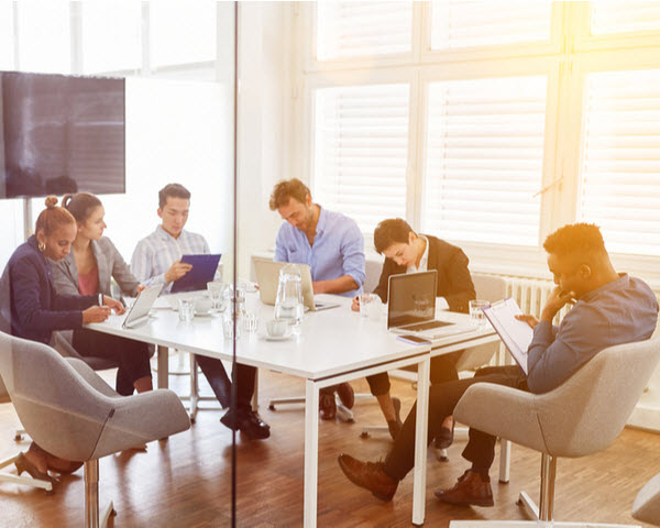 A team having a meeting inside an office room